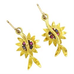 Pair of 18ct gold ruby, sapphire and turquoise earrings, each stud suspending a flower head set with single turquoise, surrounded by six alternate rubies and sapphires, stamped K18