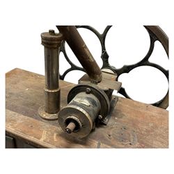 Cabinet with multiple drawers and cupboards mounted with two industrial coffee grinders with large flywheels and brass coffee reservoirs, early 20th century 