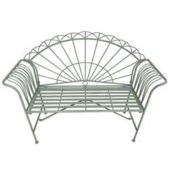 Regency design wrought metal bench, the fan back over out-swept arms, strap seat on supports united by stretchers, in pale teal finish