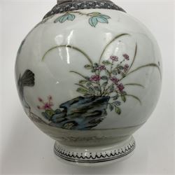 Pair of Chinese Republic porcelain vases, each painted in Famille Rose enamels with pairs of pigeons amidst peony, rock, flowering plants and leafy branches, possibly Qianlong seal beneath, H22cm 