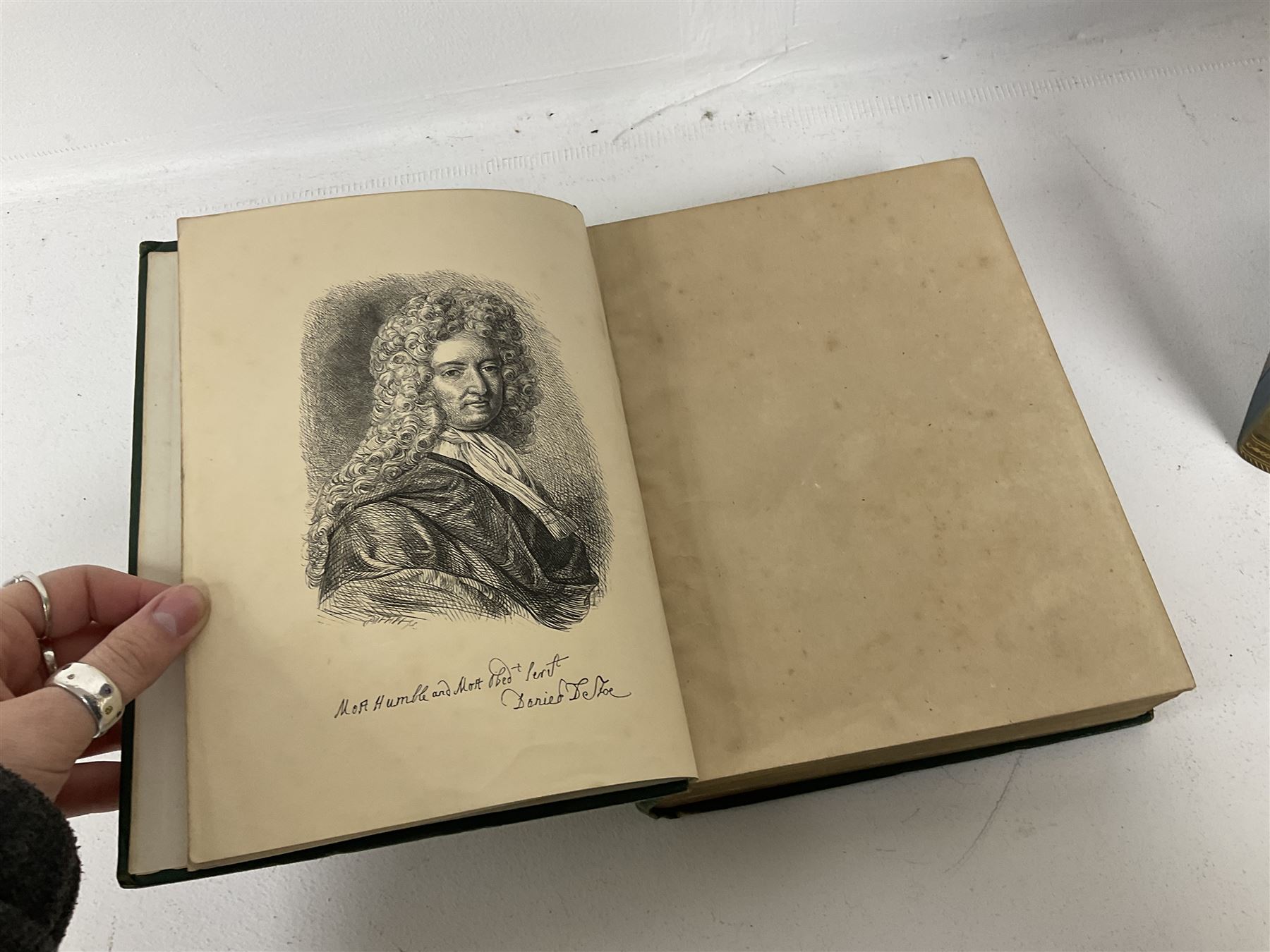 Campbell, John; The Naval History of Great Britain, two volumes, together with De Foe, Daniel; The Life and Adventures of Robinson Crusoe, pub George Routledge and Sons, London, The Works of Flavius Josephus, translated by Whiston, William, pub Henry G Bohn, London, one volume  and two other books