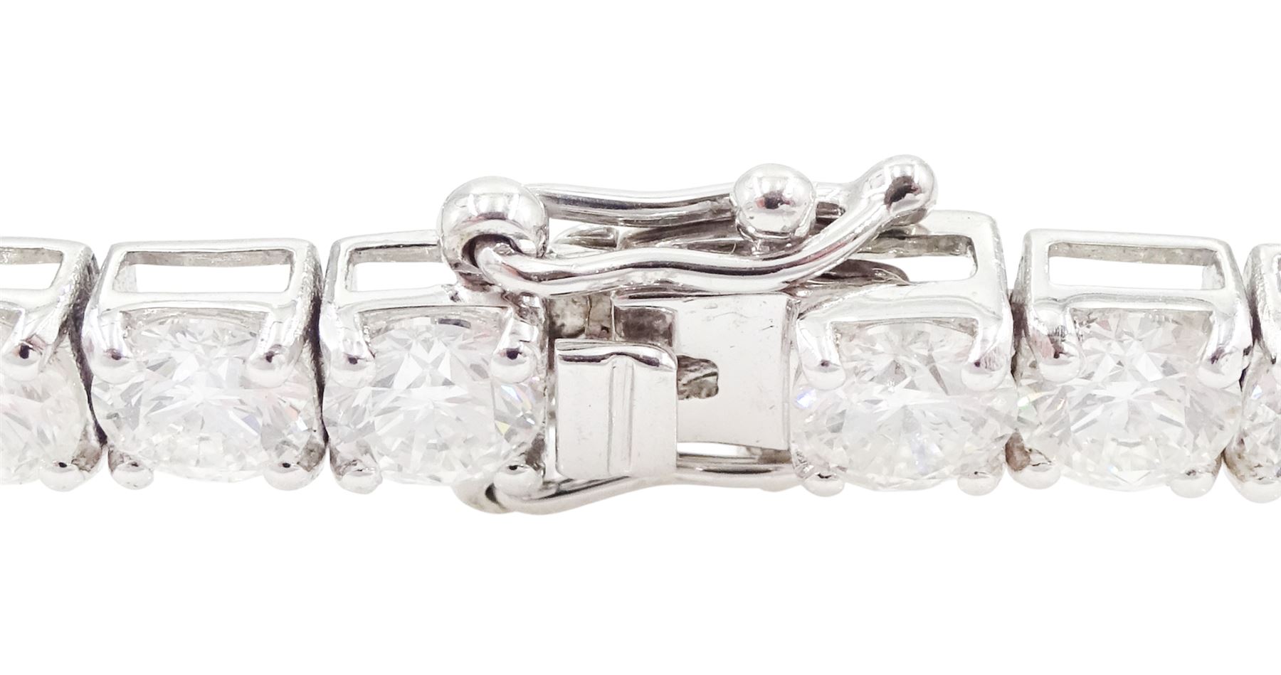 18ct white gold diamond bracelet, forty round brilliant cut diamonds , in a four claw setting, stamped 18K, total diamond weight 12.26 carat, with World Gemological Institute report