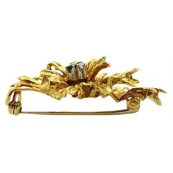 18ct gold three stone diamond and sapphire stylised flower brooch, London import mark 1969