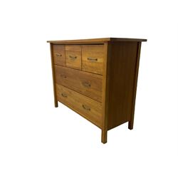 Light oak chest fitted with three small and two large drawers