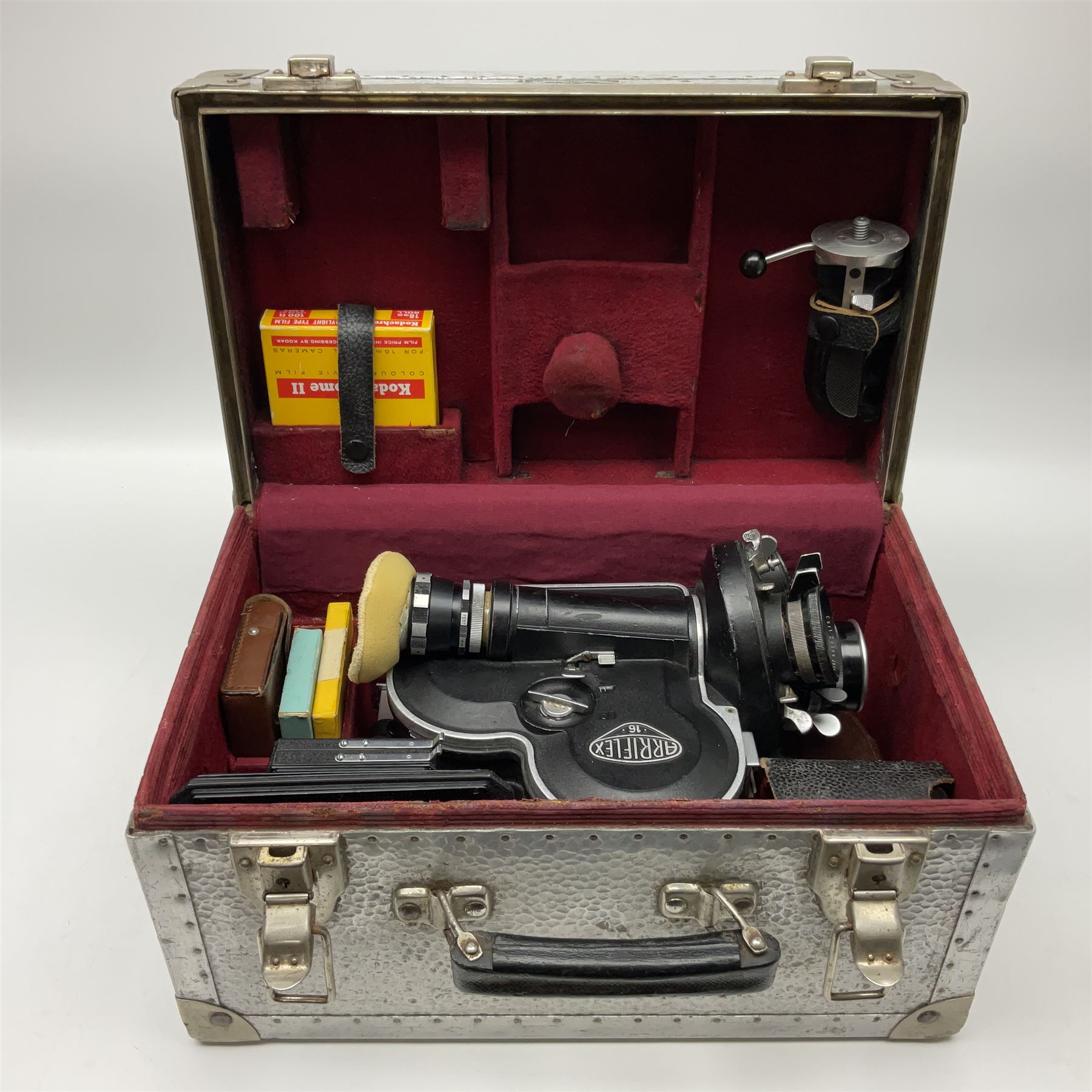 Arriflex 16SB camera body, serial no. 1784, with ' Carl Zeiss Distagon 1:2 f=8mm' lens, serial number 3860224, 'Carl Zeiss Jean Tessar 2/16' lens, serial no 3624355, camera pistol grip and other accessories, in fitted hard case