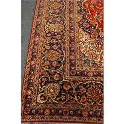  Large Persian Kashan carpet, overall trailing floral design with shaped medallion, decorated with flower heads. repeating guarded border,  436cm x 318cm  