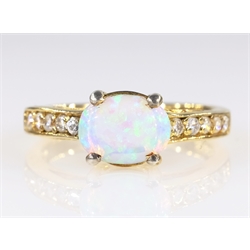 Oval opal gold dress ring hallmarked 9ct