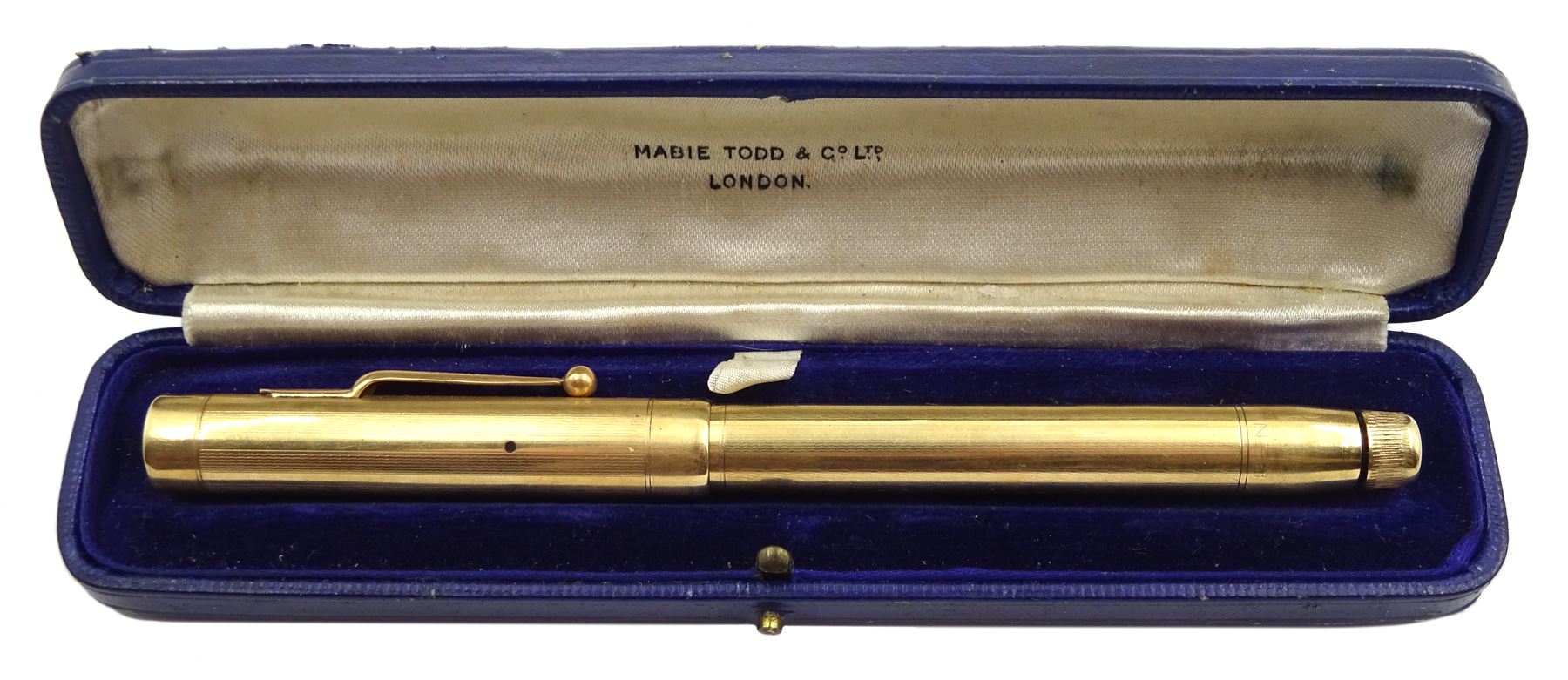 9ct gold Swan fountain pen, engine turned decoration with engraved name 'C.S.Lundgren' by Mabie Todd, London 1937, boxed 