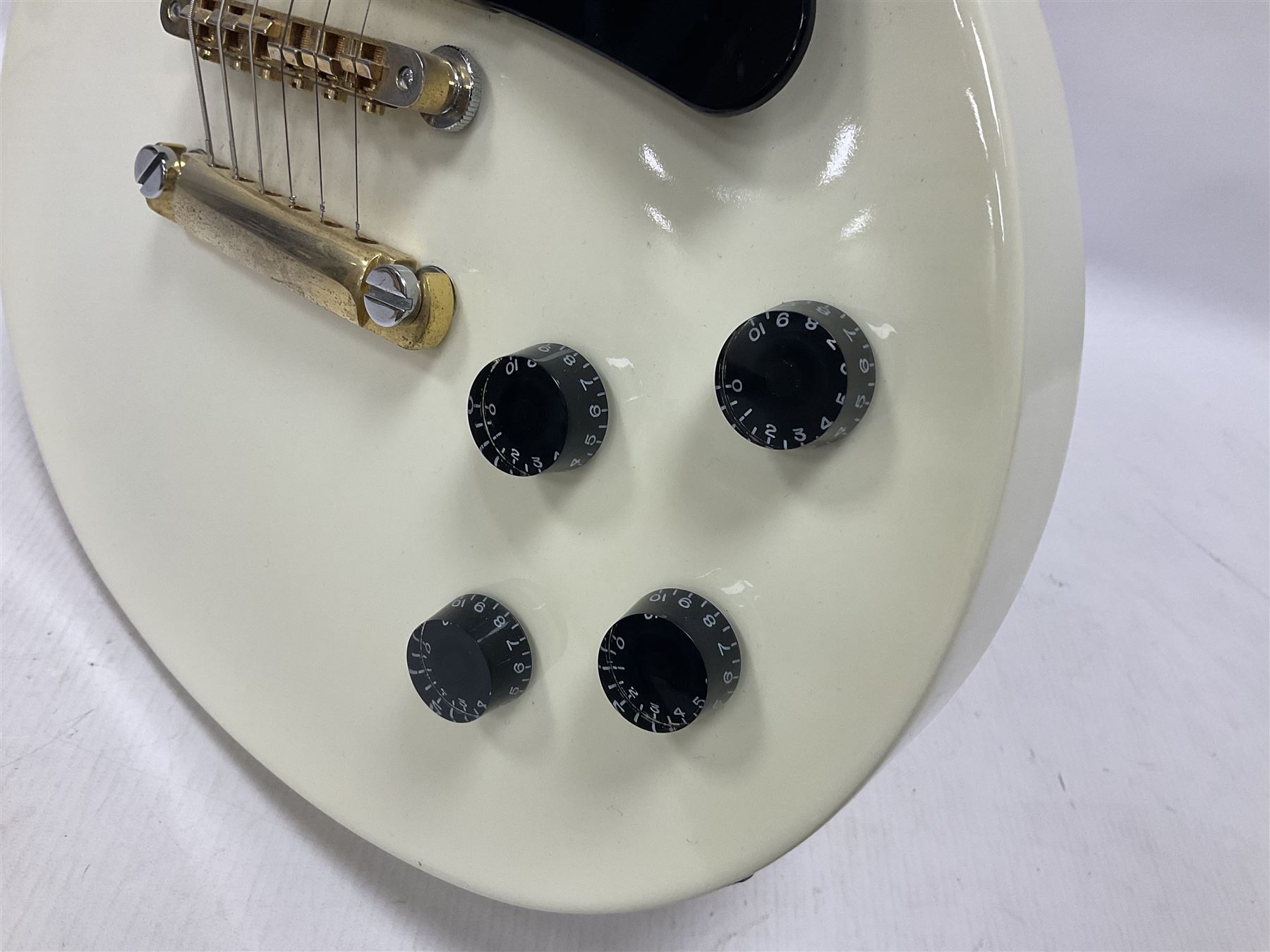 2010 Gibson Les Paul studio guitar, serial no101500537 in white finish with gold and pale green hardware, in Auden soft carry case, guitar L100cm