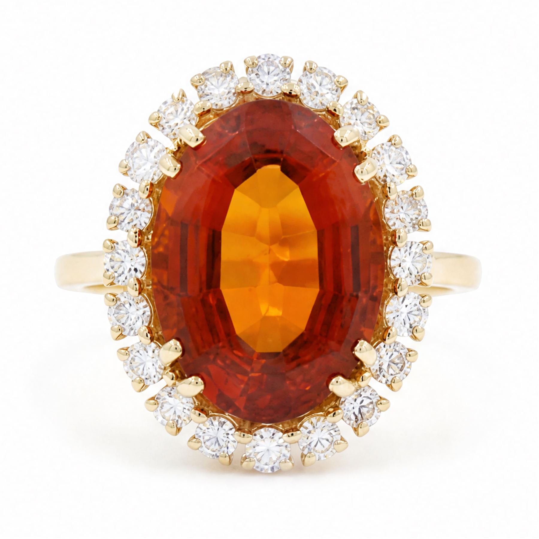 18ct gold citrine and diamond cluster ring, single oval cut citrine of approx 6.90 carat, surrounded by twenty round brilliant cut diamonds, stamped, total diamond weight approx 0.60 carat