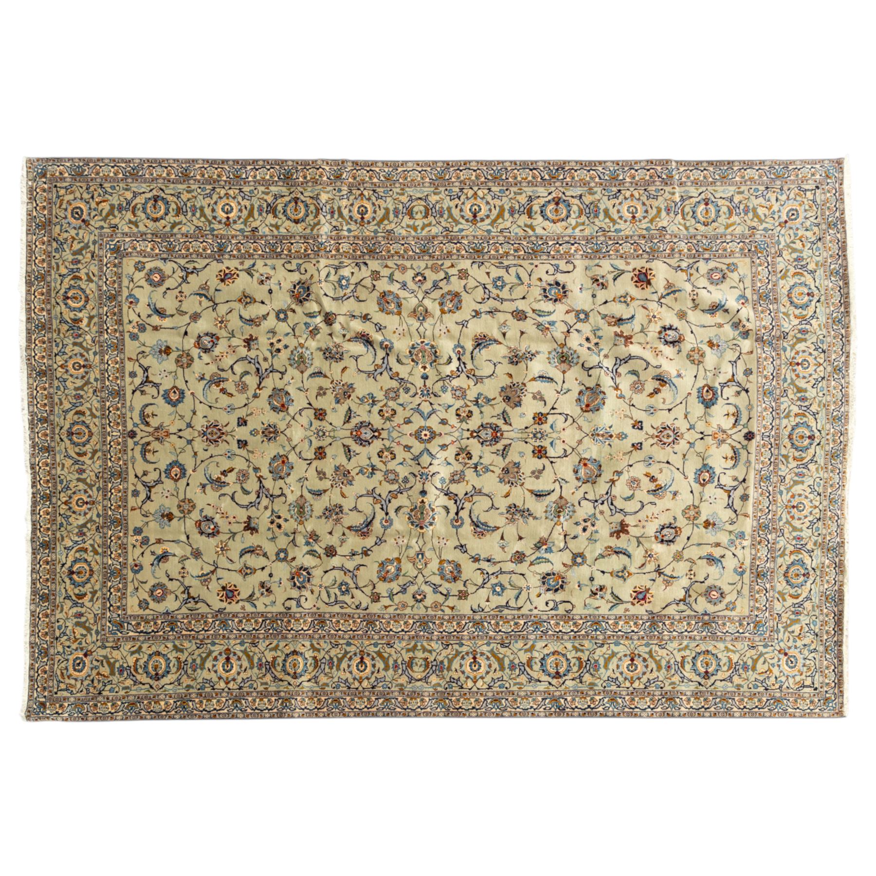 Persian Kashan rug, cream ground decorated with an all-over pattern of interlaced floral stems, rosettes and palmettes in blue, gold and rust tones, framed by layered floral borders, woven in the Kashan region of Iran