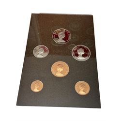 The Royal Mint Republic of Liberia 1976 proof five dollars coin in card box with certificate, Falkland Islands 1980 proof coin set in plastic display, five United Kingdom 1985 brilliant uncirculated coin collections in card folders, various unofficial coin set etc