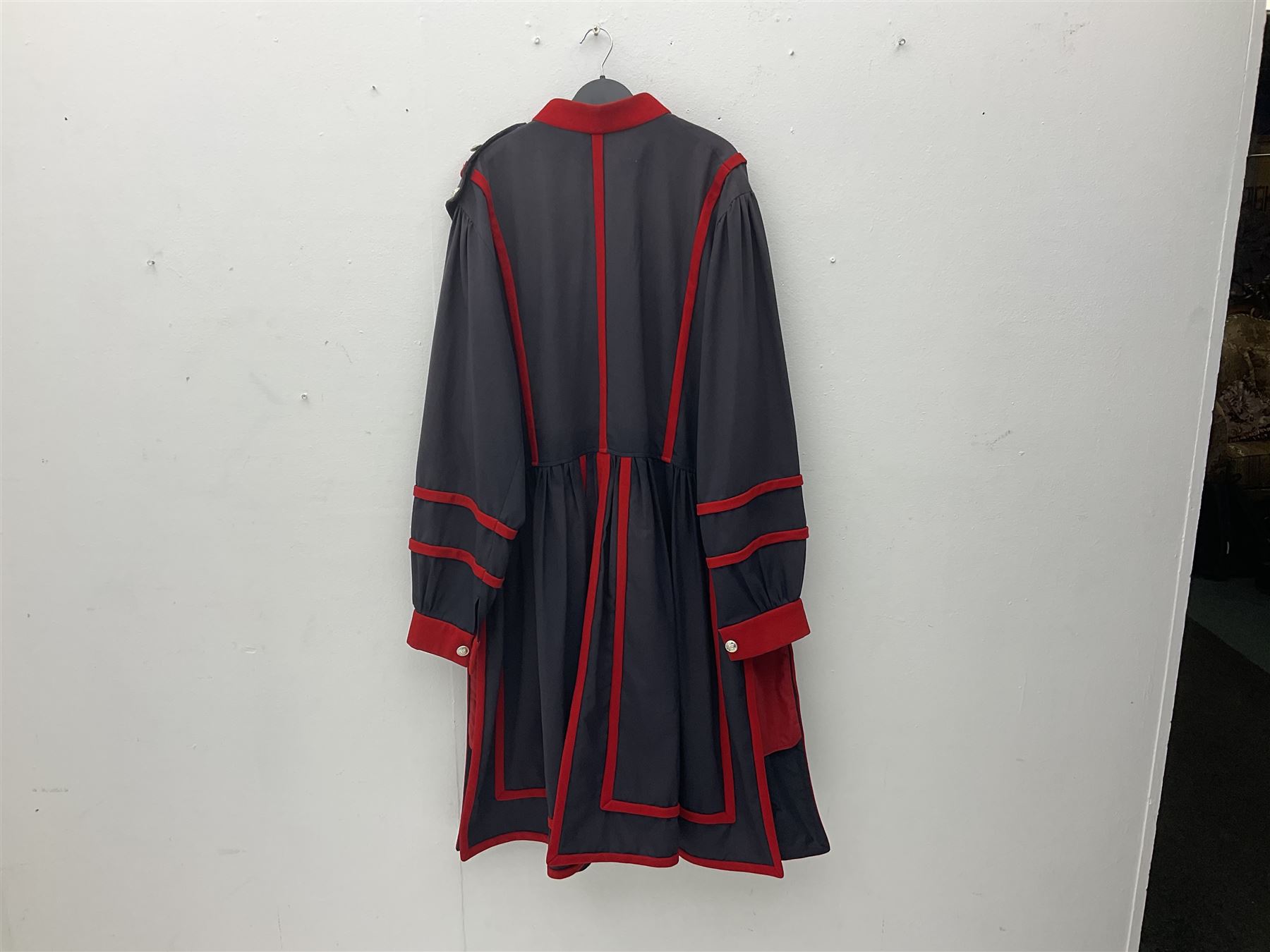 Elizabeth II Yeoman Warders (Beefeater) No.1 Undress blue uniform - comprising tunic bearing label Crown Military Uniforms H.M. Tower of London and bonnet by S. Patey (2) 