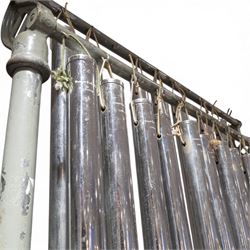 Boosey & Hawkes Ltd, London orchestral tubular bells/chimes, the chromed tubes pitch-marked and suspended on painted metal frame, frame H186cm
