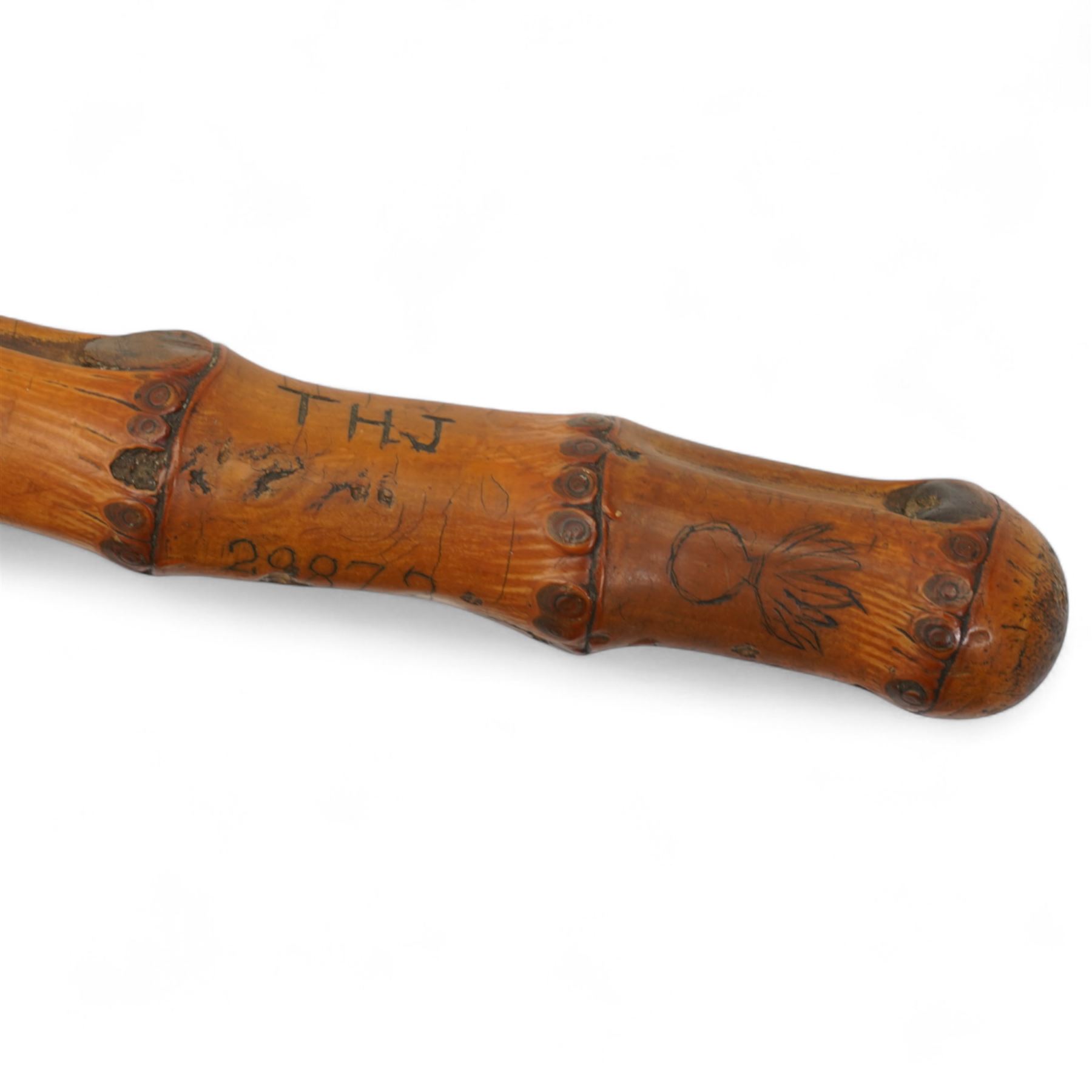 African knobkerrie, Malayan Kris, bamboo stick inscribed T.H.J. 29872, Arabian dagger with engraved curved blade and bone handle and a wooden gavel (4)