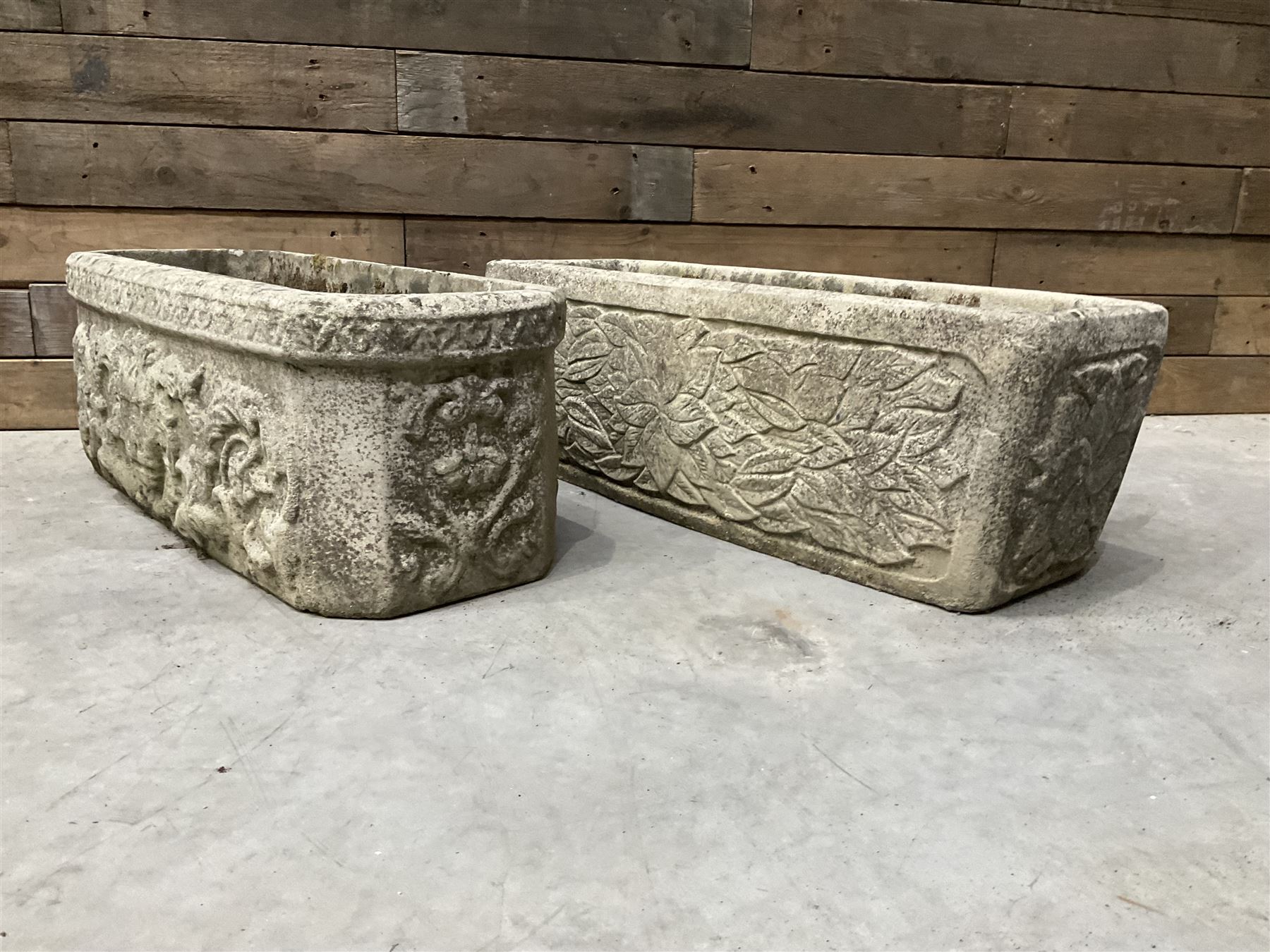 Ornate cast stone rectangular garden planter, lion mask and swag detail, and s similar planter (2)