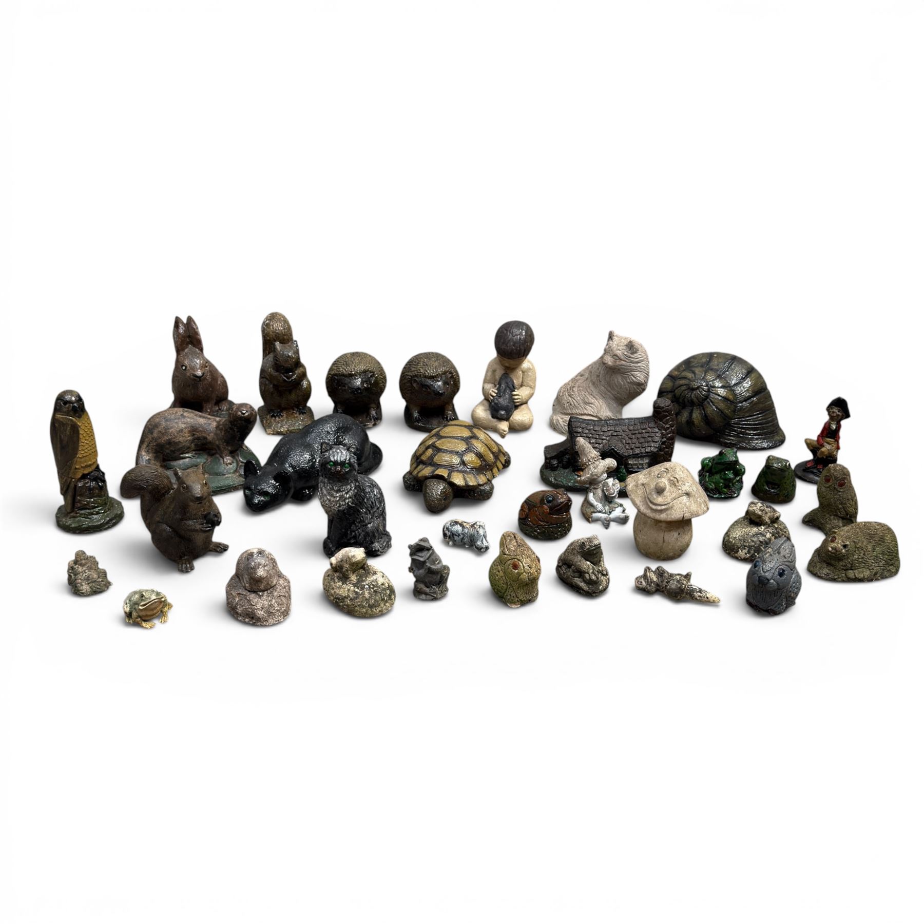 Collection of 33 small glazed cast stone garden animals and figures