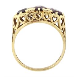 9ct gold ring, set with three oval cut garnets, London 1971