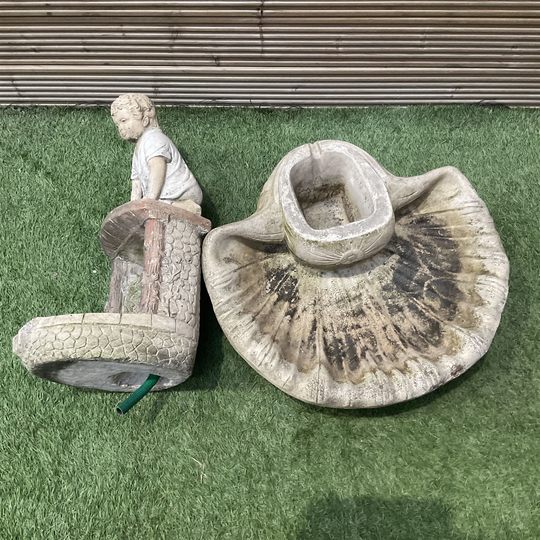 Cast stone ornament of a kneeling boy with a water feature  - THIS LOT IS TO BE COLLECTED BY APPOINTMENT FROM DUGGLEBY STORAGE, GREAT HILL, EASTFIELD, SCARBOROUGH, YO11 3TX