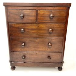 Victorian mahogany chest, two short and three long drawers, turned supports 