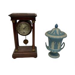 Late 19th century Wedgwood blue jasperware urn and cover, and a gazebo style clock