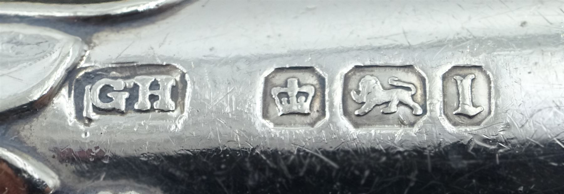 Edwardian silver handled three piece carving set, the knife blade stamped Asprey Bond Street, hallmarked Harrison Brothers & Howson, Sheffield 1903, contained within a fitted case, the interior silk lining marked Asprey 166 Bond St London 