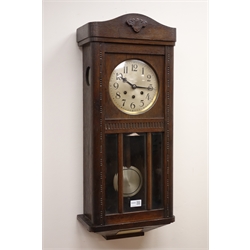  20th century oak presentation wall clock with bevel glazed door, silvered dial and Westminster chiming triple train movement with pull repeat, striking on rods, brass plaque dated 1928, H76cm   
