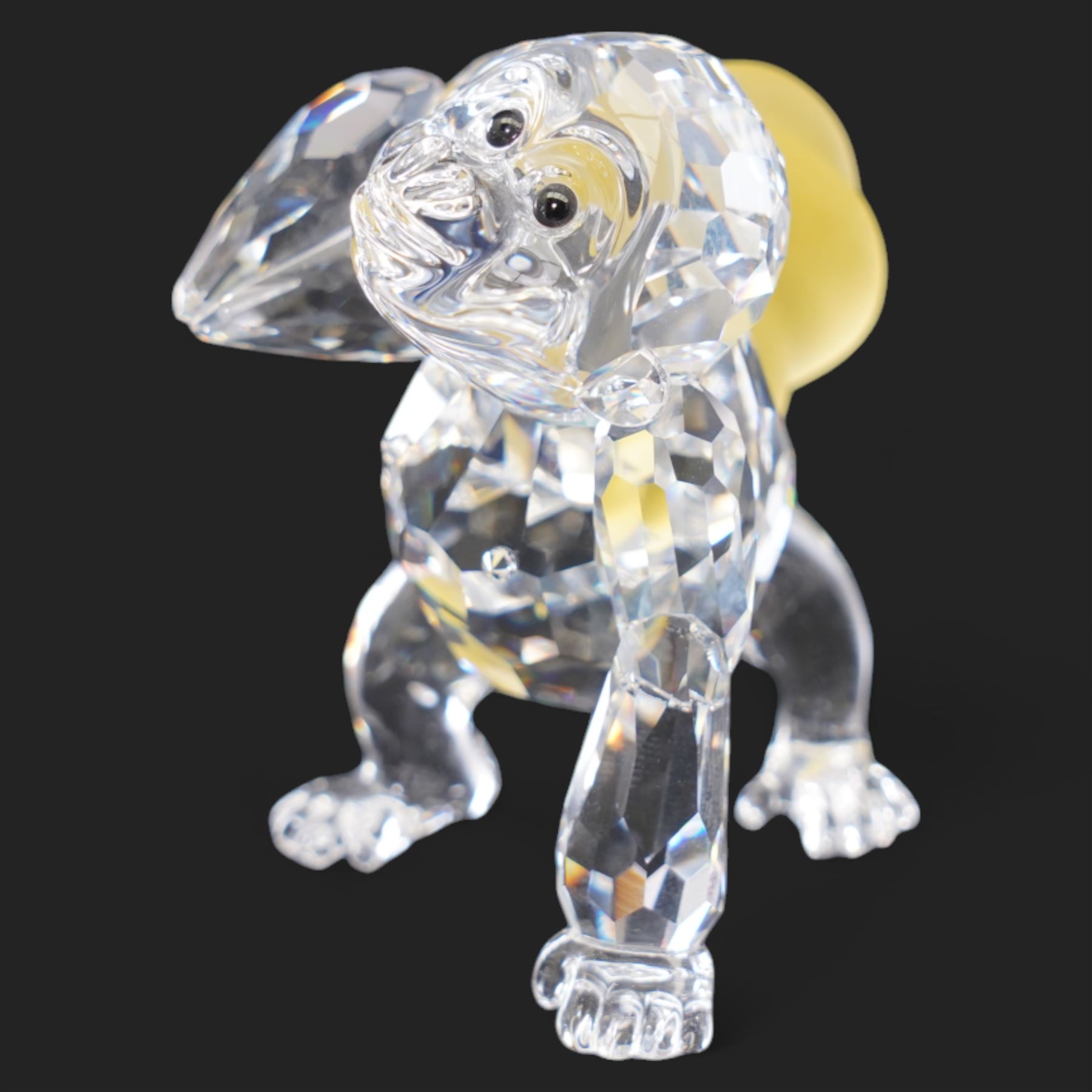 Swarovski crystal 'Antonio' ornament from the 'Magic of Dance' collection with accompanying plaque and stand, together with a Young Gorilla and Fox, boxed (3) 