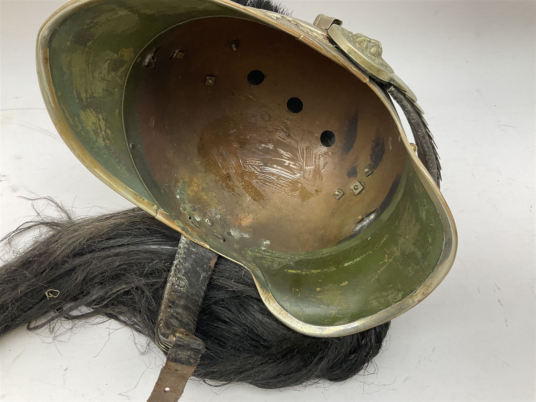 French Model 1913 mounted gendarmerie helmet; brass bodied with nickel mounts, chin strap, comb and horse-hair H27cm (no liner)