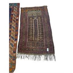 Turkish rug or wall hanging, blue ground field with decorative panels, with geometric motifs and multi-band border (207cm x 104cm), and a prayer rug with repeating border and geometric motifs (150cm x 92cm)