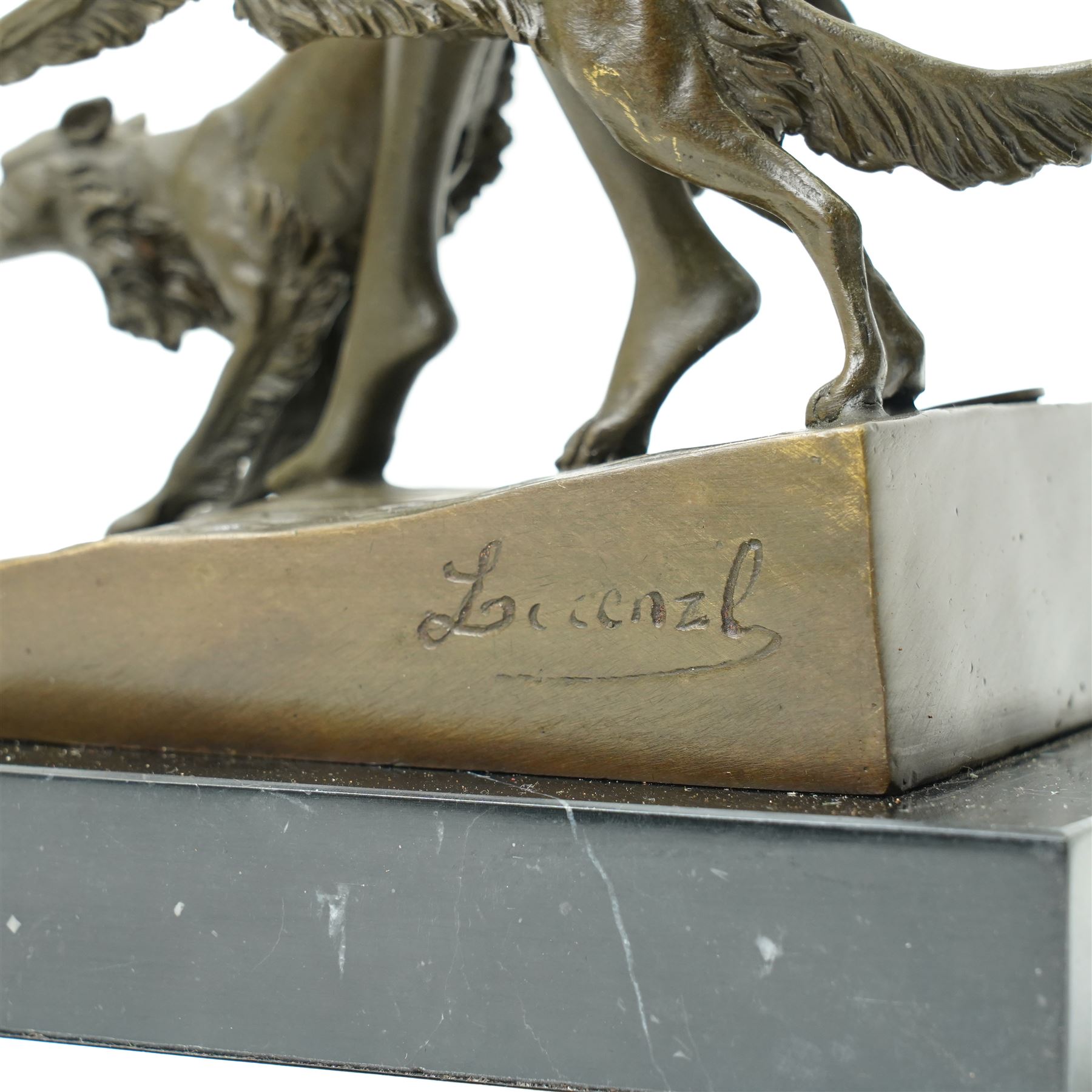 Art Deco style bronze, after Josef Lorenzl, modelled as a nude female figure holding a bow, with two dogs,  raised upon a rectangular base, H33cm