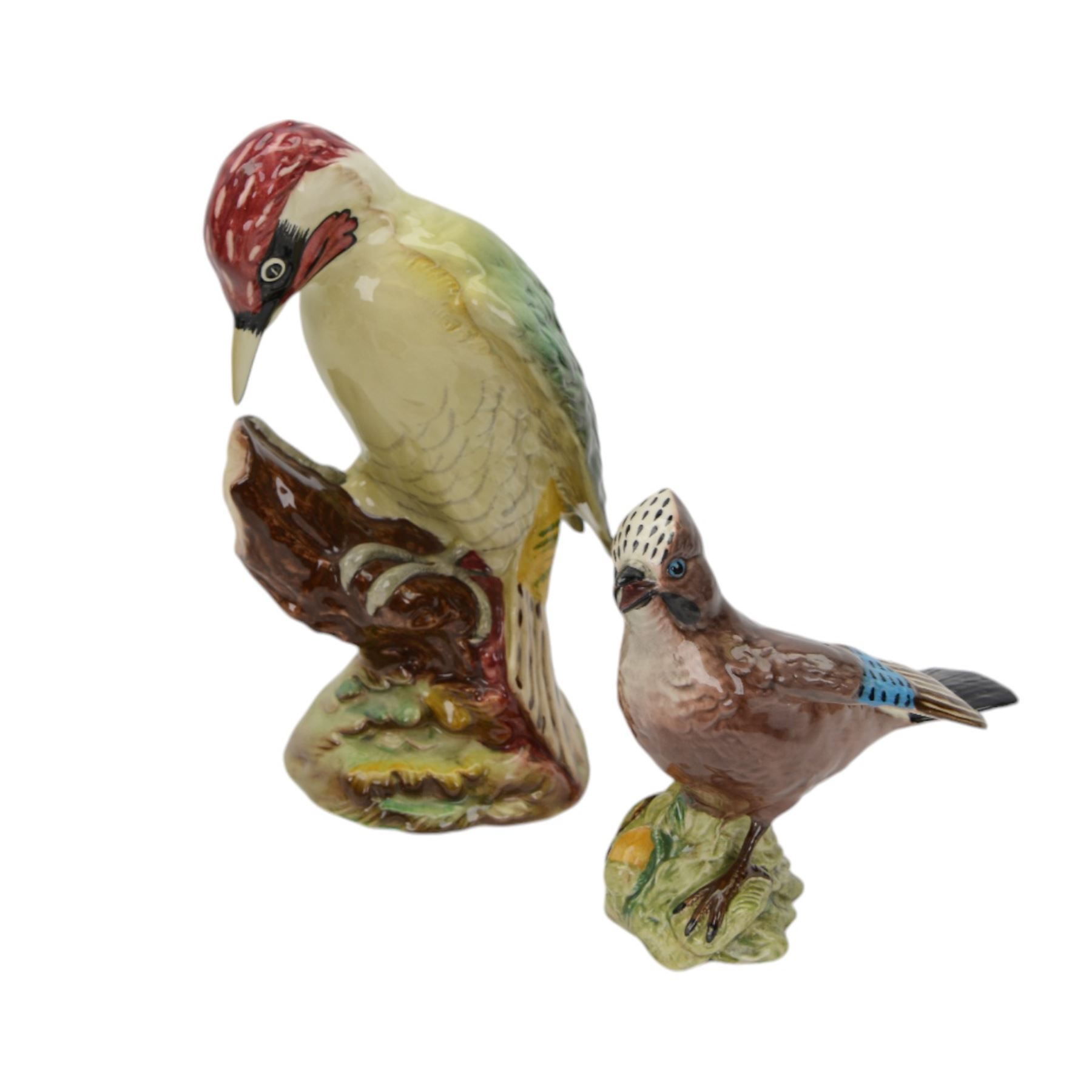 Eleven Beswick bird figures, including Lesser Spotted Woodpecker 2420, Kestrel 316, Lapwing 2416 etc   