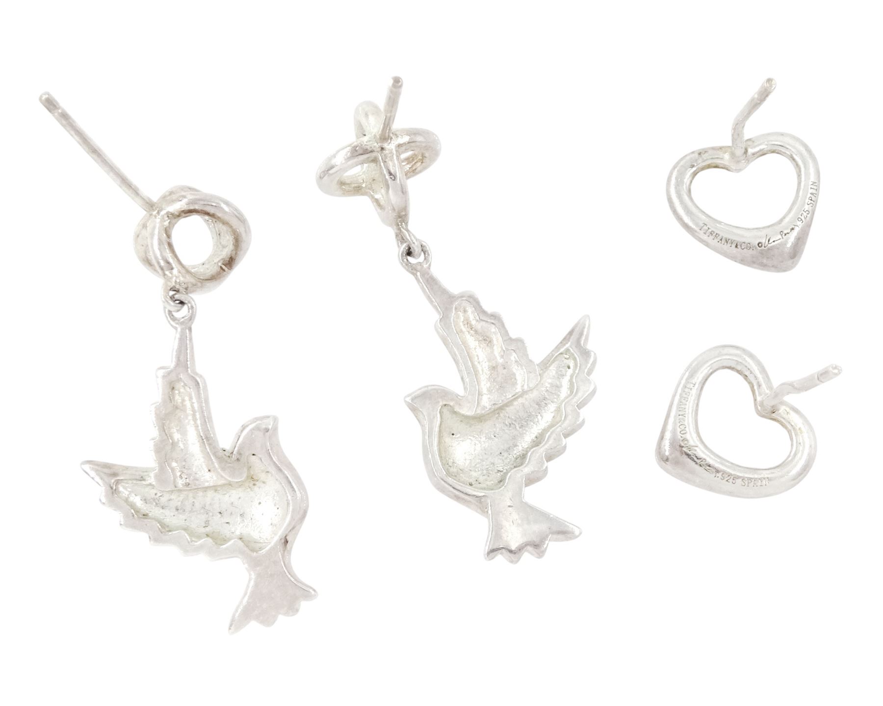 Tiffany & Co two pairs of silver stud earrings including pendant dove earrings designed by Paloma Picasso and heart earrings designed by Elsa Peretti