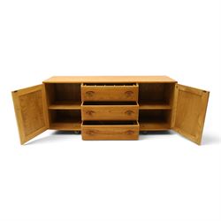 Ercol - mid-20th century light elm and beech Windsor 'model 455' sideboard, rectangular top over three central drawers flanked by cupboards, on castors