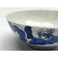 18th century Chinese blue and white bowl painted with a continuous scene of figures in a river landscape, with Artemisia leaf mark beneath, D13cm, together with a Chinese porcelain bowl enamelled with Buddhist lions with brocade balls and ribbons, surrounded by scrolling clouds and flames, unmarked, D14cm, (2)