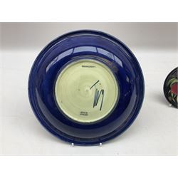 Moorcroft Clematis pattern plate and pin dish, both upon a blue ground with impressed marks beneath, plate D22cm