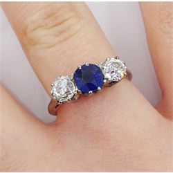 Early 20th century gold three stone old cut diamond and round sapphire ring, sapphire approx 0.60 carat, total diamond weight approx 1.00 carat