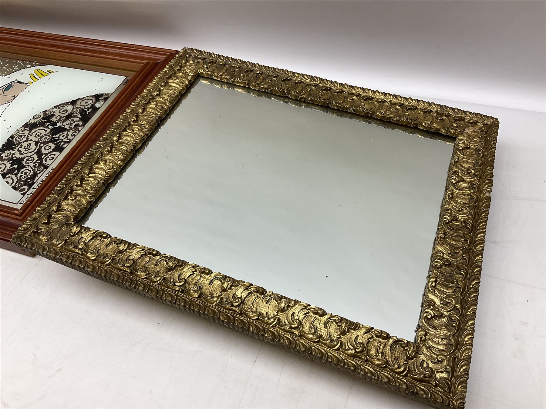 Wall mirror printed with a February 1919 Vogue cover of an Art