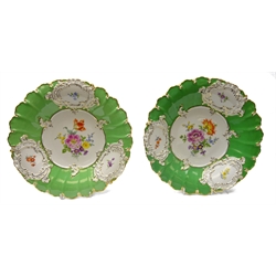  Two Meissen cabinet plates with shaped rim and hand painted floral sprays within gilt borders, crossed swords mark & pattern no. 716e/ 81, D30cm   