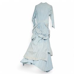 Victorian ladies button-down bodice and skirt, in blue and white striped fabric with pleated detailing, the skirt with gathered bustle back