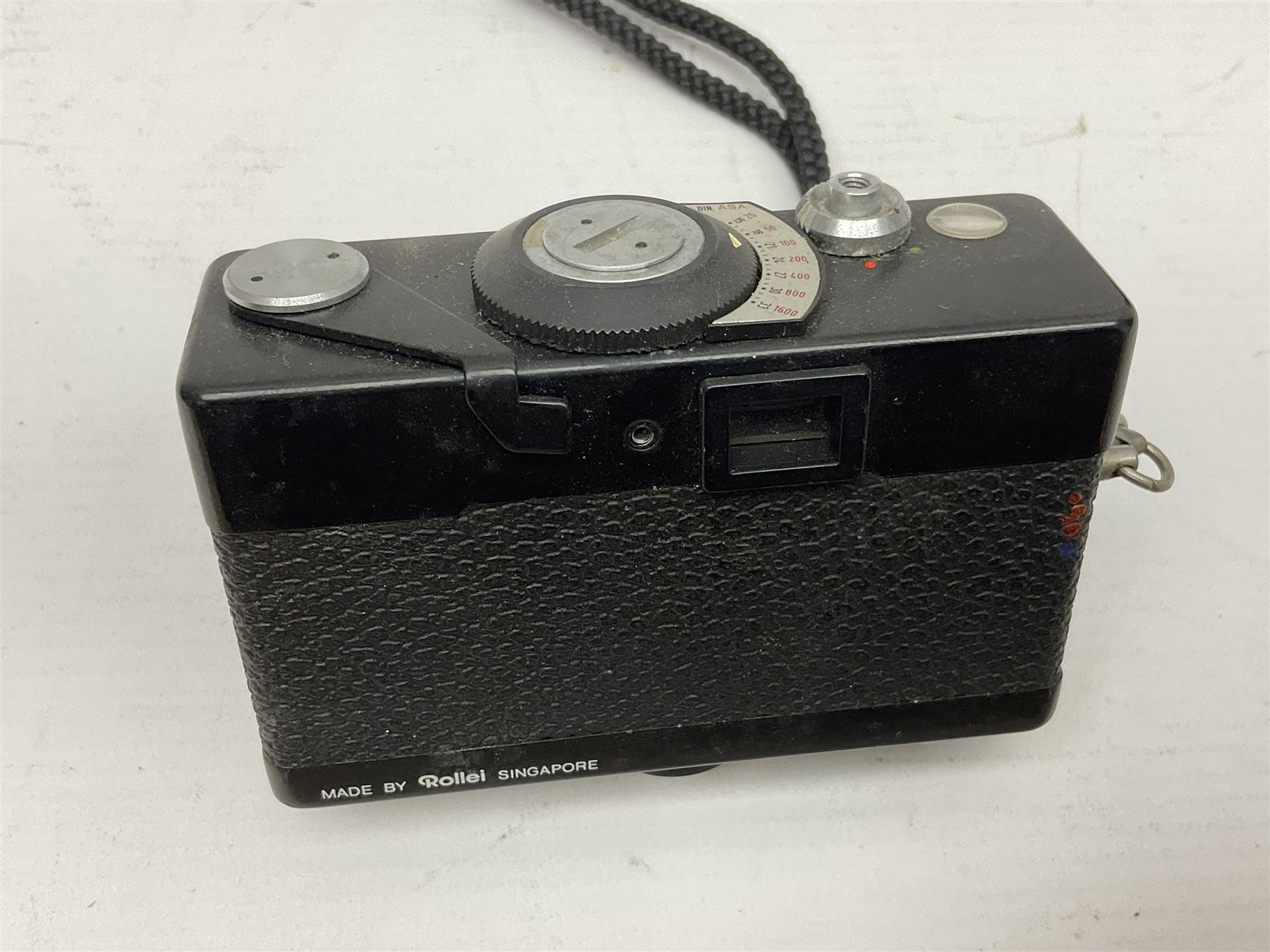 Three Rollei cameras, to include a Rollei 35 LED camera, with Triotar 3.5/40 lens and two Rollei XF 35 cameras, each with Sonnar 2.3/40 lenses