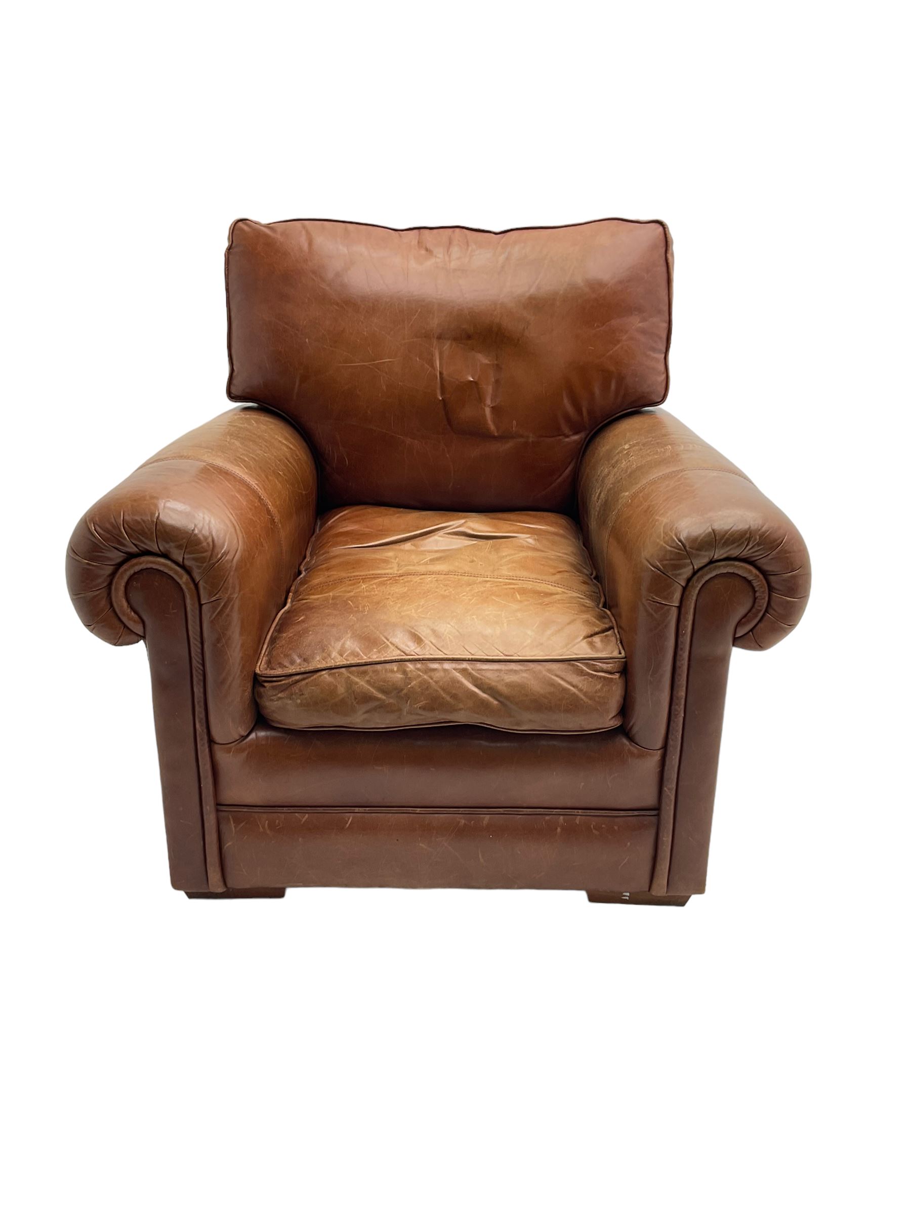 Large two seat sofa upholstered in tan 'Derwent' leather (W200cm D100cm H85cm), and matching armchair (W95cm)