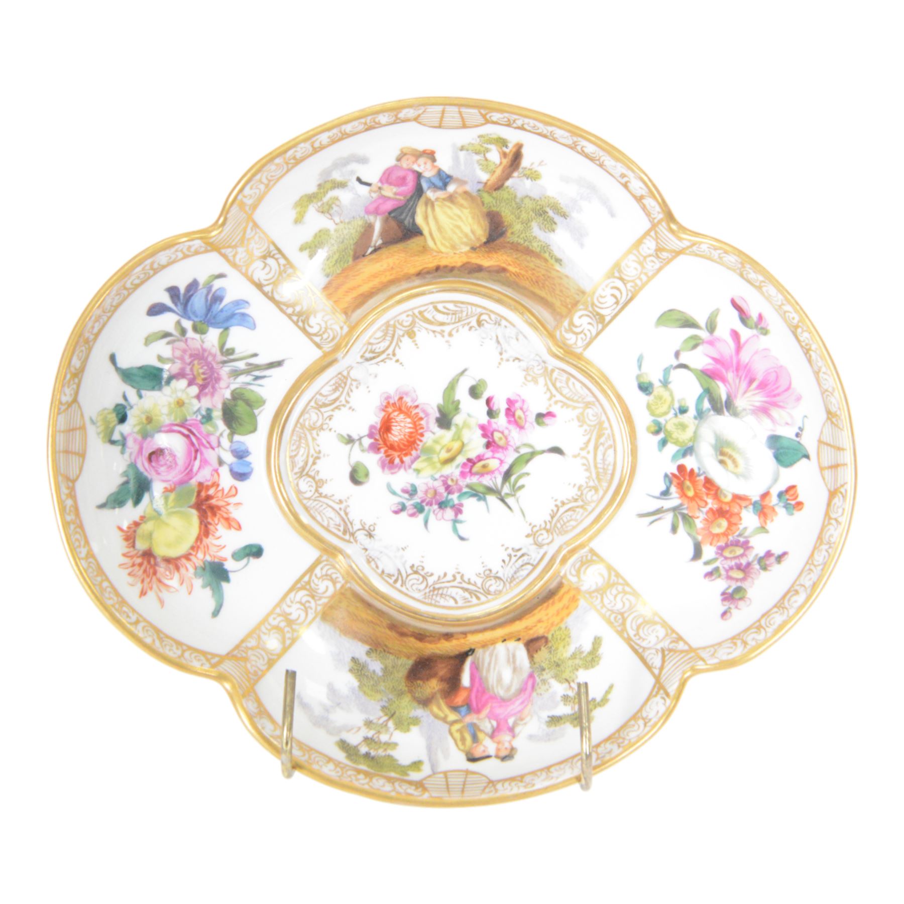 19th century Helena Wolfsohn for Dresden quatrefoil lidded bowl and stand, the panels decorated with figures in landscapes and floral sprigs, with a lemon finial to the lid, H18cm 
