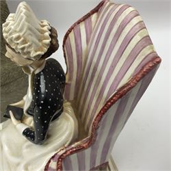 Royal Worcester limited edition figure, Sister St Thomas Hospital (London), no 180/500, modelled as a nurse in uniform, sitting on a striped wingback chair, with printed mark beneath, in original box with certificate, H16cm