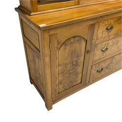 David Shackleton of Snainton - highly figured elm dresser, projecting moulded cornice over raised display cabinets and shelves, the base fitted with three central drawers and flanked by panelled cupboards, inscribed 'DS 1990'