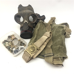  Collection of Militaria including silver ARP cap badge and shoulder titles, WW2 medals, sweetheart brooch etc, canvas bag, belt and gas mask   