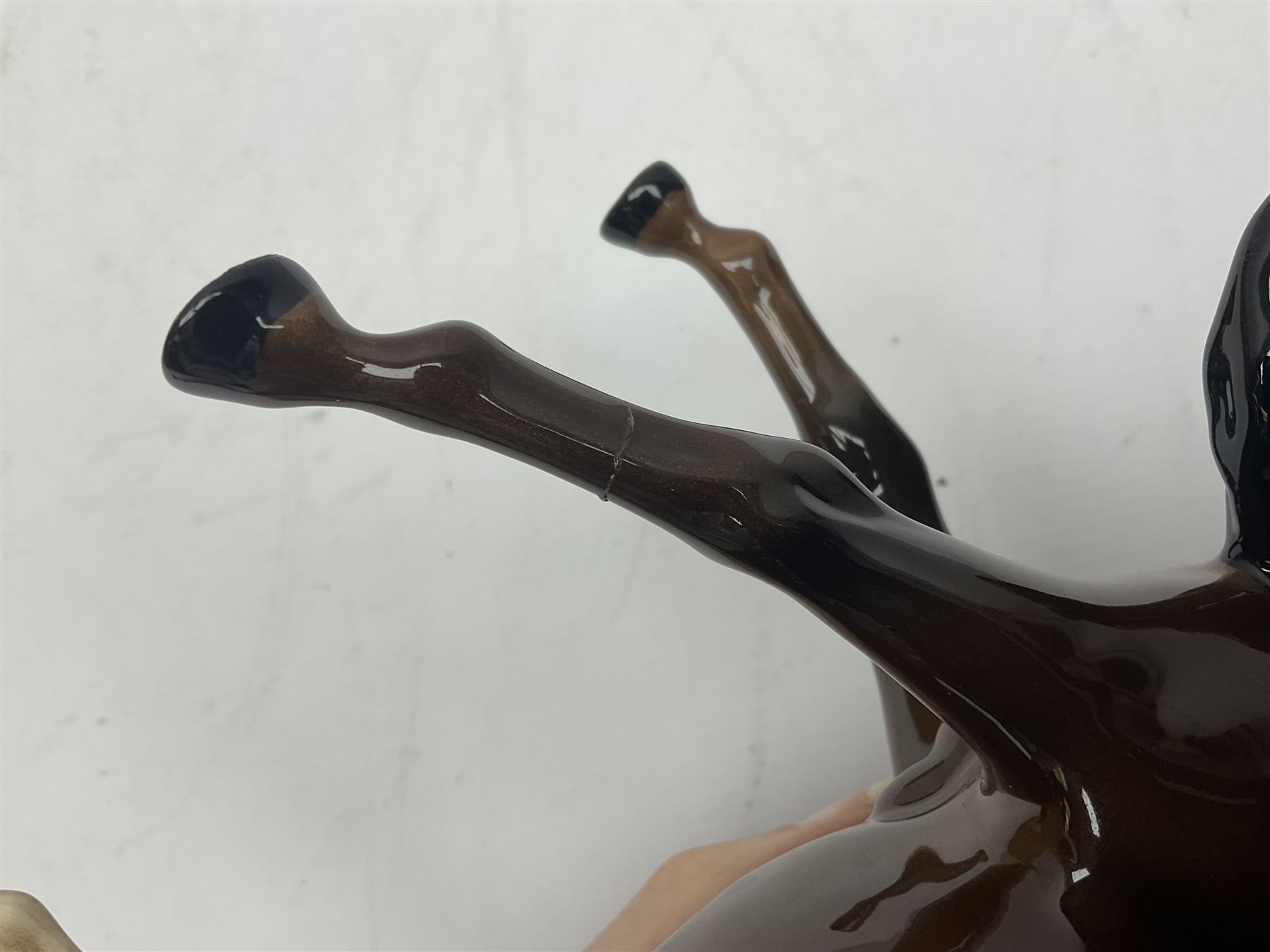 Four Beswick horses, including Exmoor no 1645, Black Beauty foal and two others 