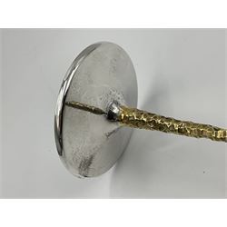 Pair of modern silver candlesticks by Stuart Devlin, the tapering parcel gilt stems with signature textured detailing, each supporting a fluted candle holder and upon a spreading circular foot, hallmarked Stuart Devlin, London 1973, H25cm