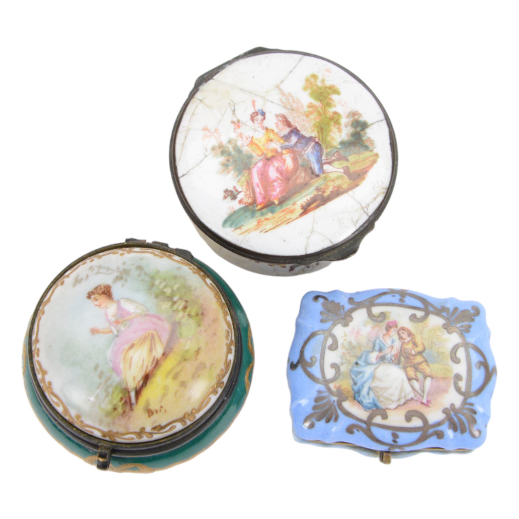 Ten porcelain boxes, of various form, each with printed decoration of figures