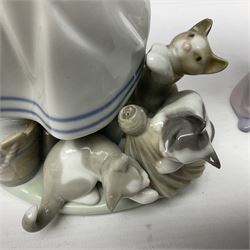 Five Lladro figures, including The Lamp Lighter no 5205,  Girl and Kittens no 6102, Cat no 5113 etc